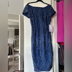 Brand new blue dress with lace pattern